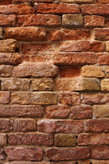Old cracked red bricks texture