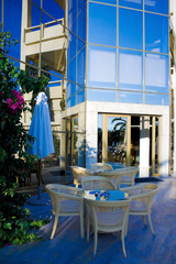 Reflection of chairs in hotel windows