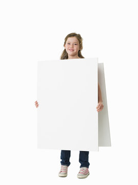 Young girl wearing plain white sandwich board