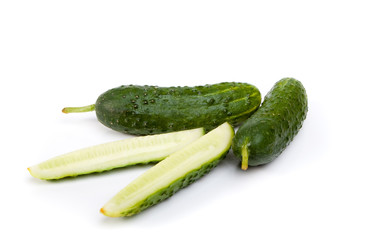 Cucumber and slices isolated on white background