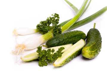 Cucumber and onoin on white background