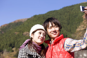 Fototapeta premium 記念撮影をしているカップル