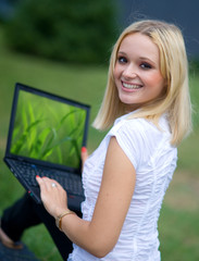 woman with laptop outside