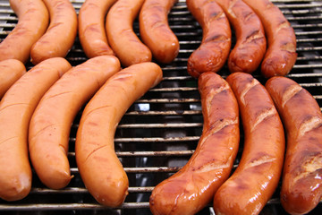 Sausages on barbecue grill