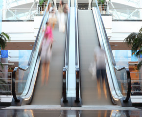 Escalator with motion blur on the steps