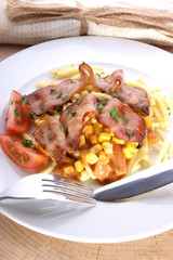 Pasta with bacon and sweet corn tomato sauce