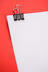 Paper clip on corner of papers