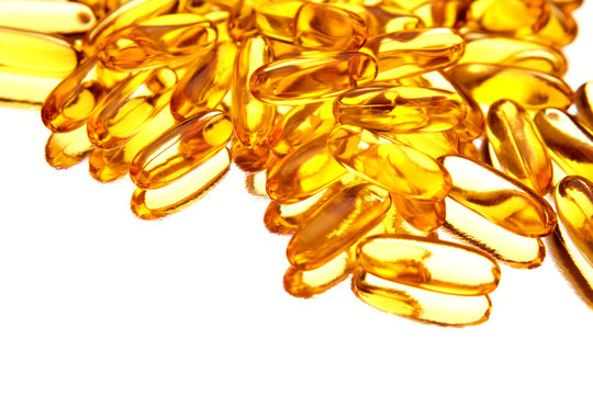 Omega 3 Fish Oil Capsules Over White Background