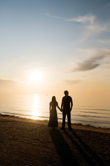 Man and woman near a sea