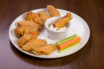 barbecue form chickens wings with white sause