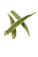Fototapeta premium Three green okras on a white background