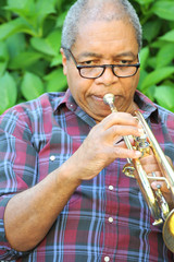 African american male trumpet player.