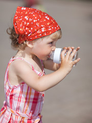 Little girl drinking