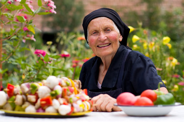 Elderly woman with fresh food
