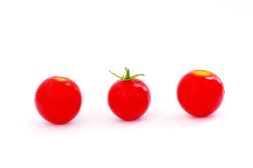 ripe red tomato on the white background