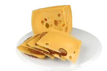 chunk of yellow cheese with slices