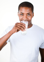 Man drinking a glass of Milk