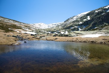 dark lake at gredos mountains