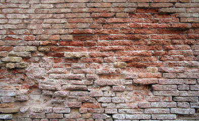 Obraz premium historical red brickwall damaged background
