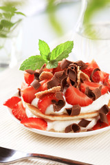 Pancakes with curd cheese and strawberries