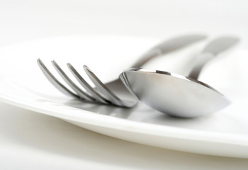 Photo of fork and spoon on plate