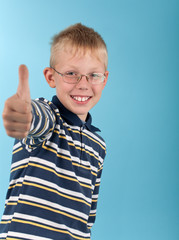 Smiling teenager show thumb up sign