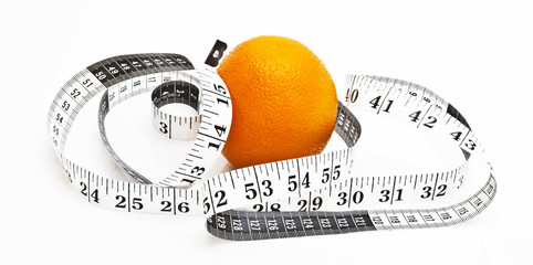 fresh orange with measuring tape