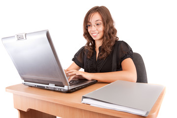 Naklejka premium Attractive businesswoman at desk