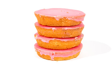 Pink glazed cookies stacked