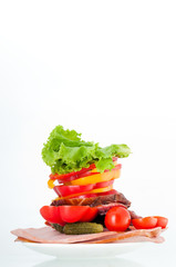 Tomatoes, ham and salad