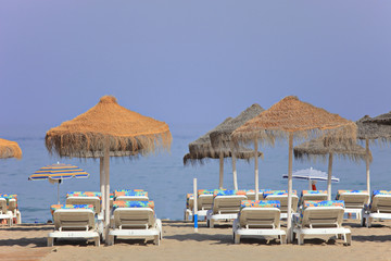 Beach beds at Los Boliches beach, Fuengirola, Spain