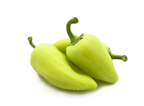 Fresh green pepper on a white background