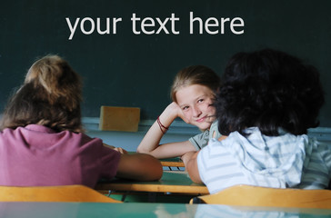 Classroom at school and text on green board