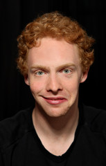 Man pulling unusual face