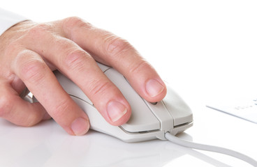 Hand On Mouse With Portion Of Credit Card