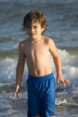 Fototapeta na wymiar Boy in the ocean