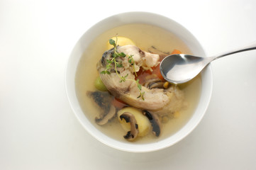 carp soup with mushroom and fresh organic vegetables