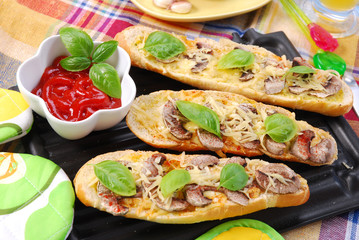 roasted baquette with cheese and mushrooms