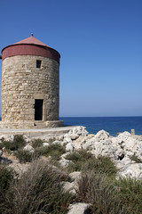 Ancient windmill on greek island
