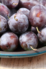 Plums on table, close-up