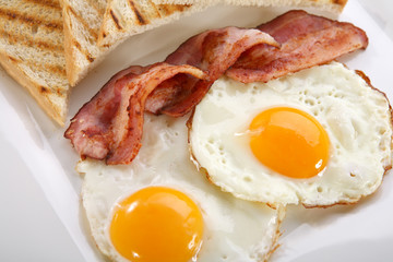 Breakfast - toasts, eggs, bacon