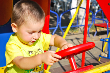 Fototapeta na wymiar boy play on playground