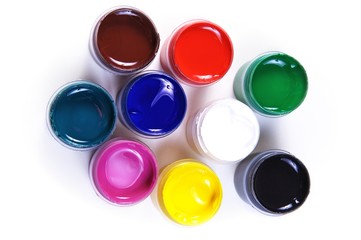opened containers with paint of different colours