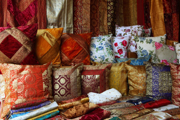 colorful decorative eastern pillows, cushions and fabric at the