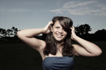 Fototapeta premium Young teenager touching her head