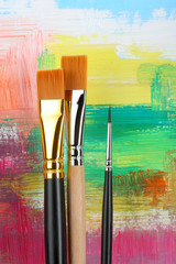 brushes on painted background..