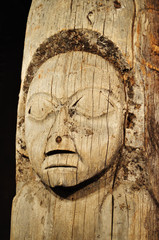 Old, Weathered Tlingit Totem Pole with Human Face