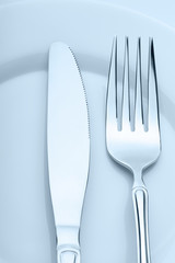 Knife and fork on a plate