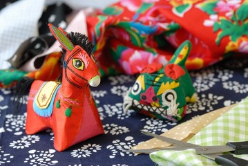 Obraz premium View of Chinese Traditional Cloth-Art --Donkey and Tiger.