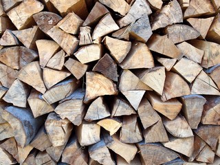 Wooden logs background.